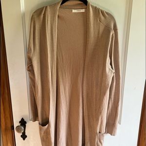 Boutique cardigan with pockets. Never worn.